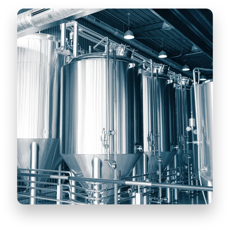 Food processing plant with industrial tanks