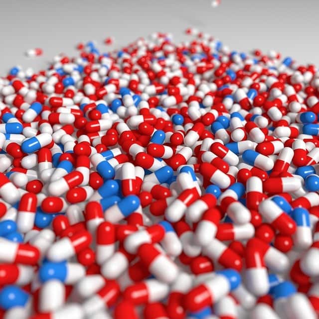 How can a CMMS enhance maintenance management in pharmaceuticals?