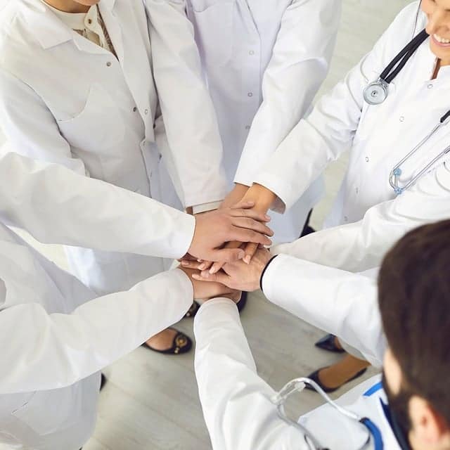 How can a CMMS ensure the proper functioning of critical healthcare equipment?
