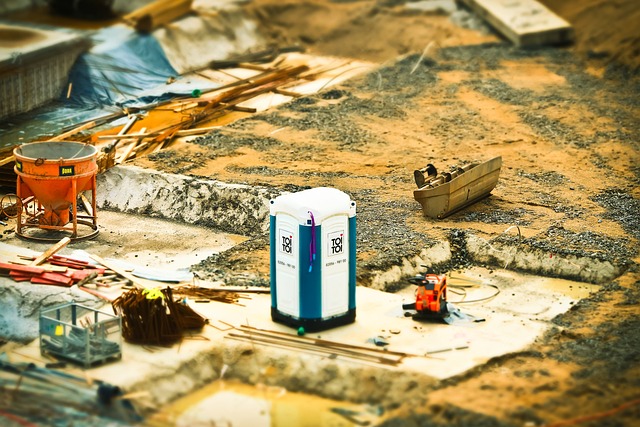 How does a CMMS assist in managing multiple construction sites?