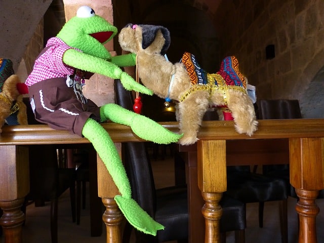 How does a CMMS assist in predictive maintenance for entertainment equipment?