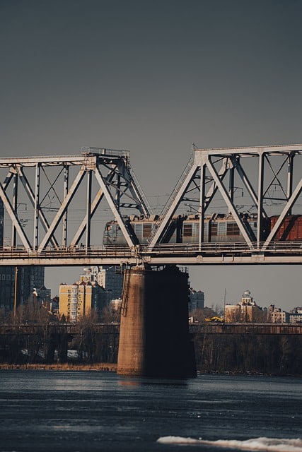 How does a CMMS enhance infrastructure management in utilities?