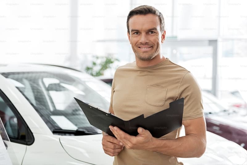 What are the advantages of using a CMMS in the automotive industry?